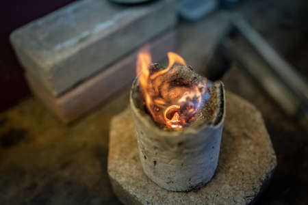 In a small factory, traditional silver melting takes place.の写真素材