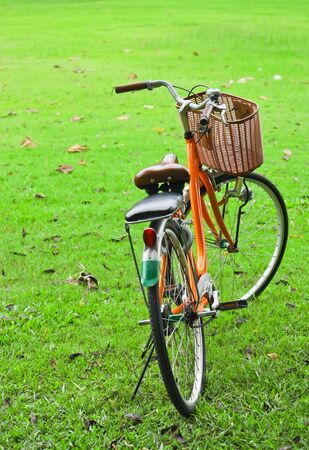 bicycle on green meadow の写真素材