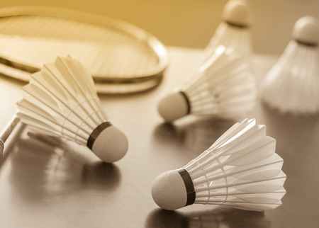 Shuttlecocks and racket with light effectの写真素材