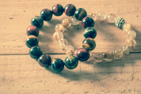 Bracelet on wood backgroundの写真素材