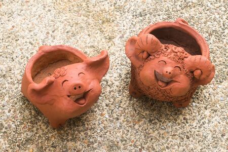 Clay pottery dolls on  backgroundの写真素材