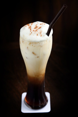 Iced coffee latte on black background. Close-upの写真素材