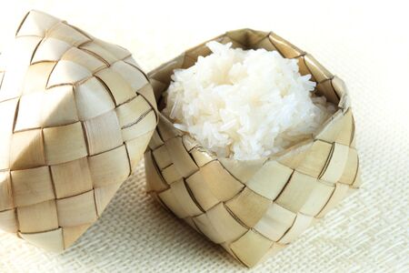 Sticky rice (Glutinous rice) in bamboo container (kratip). Sticky rice is popular type of rice in Thailand.の写真素材