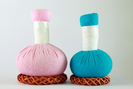 Traditional thai spa herbal compress balls isolated on white background.の写真素材