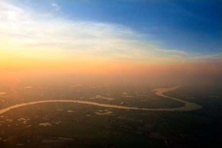 Aerial view of Ping River across paddy field, Chiang Mai, Thailand.の写真素材