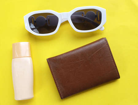 top view and flat lay black magnifying glass and calculator on yellow background.Business and finanse conceptの写真素材