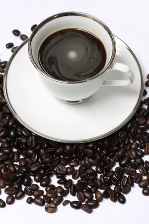 Cup of Coffee and Coffee beans on white の写真素材