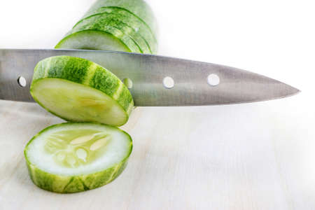 knife chopping cucumberの写真素材