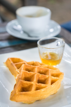 belgian waffles with caramel sauceの写真素材