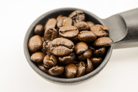 close up coffee beans in portafilterの写真素材