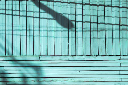 shadow of electric wires on vintage tone wooden background