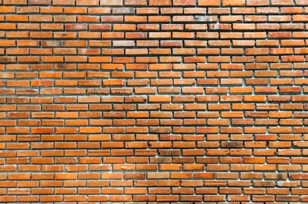 Background of old vintage brick wallの写真素材