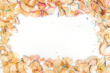 education frame made of color pencil shavings a on a white paperの写真素材