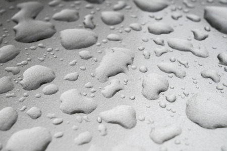 rain drops on car roof, shallow focus, shallow focusの写真素材