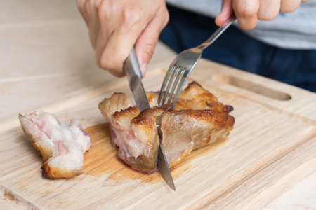 close-up of medium rare roast pork neckの写真素材