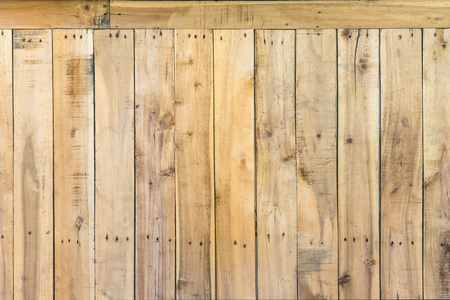 background and texture of wood stripe decorative fence wall surfaceの写真素材