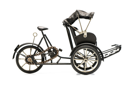 small black tricycle transportation toy modelの写真素材