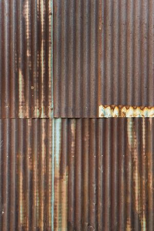old rusty zinc plate wall backgroundの写真素材