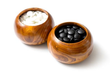 Chinese, Japan, Korean board game GO with black and white stone. Go or wei-Chi - WeiQi traditional asian board gameの写真素材