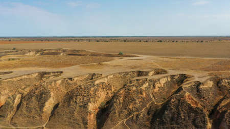 canyon of red soil on the sea coast