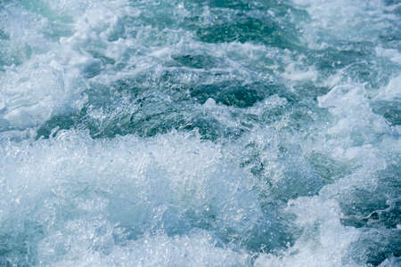 footprint on the water after the ship. bubbling water texture