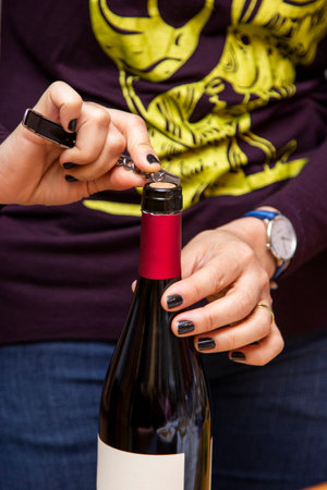 Red wine being opened to be served in tasting.の写真素材