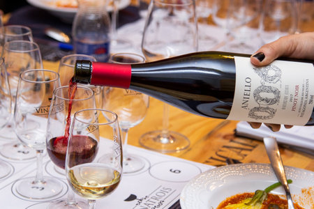 Wine being served in bowls for tasting.のeditorial素材