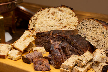 Delicious slices of homemade bread on the wooden board.
