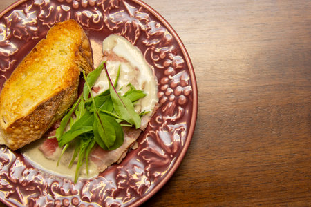 Vitello Tonnato with parmesan cheese tostata (parmigiano reggiano).の写真素材