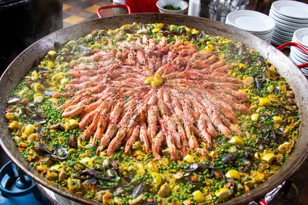 Traditional spanish paella with seafood and pork. Preparedの写真素材