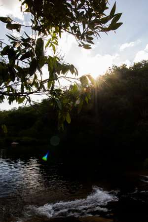 Beautiful lake in sunset formed by waterfalls - Serra da Canastra National Park - Minas Gerais, Brazil - Jan 2018の写真素材