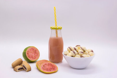 Brazilian guava sweets on white background. Biscuit with guava juiceの写真素材