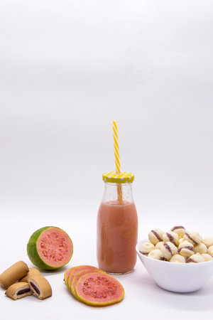 Brazilian guava sweets on white background. Biscuit with guava juiceの写真素材