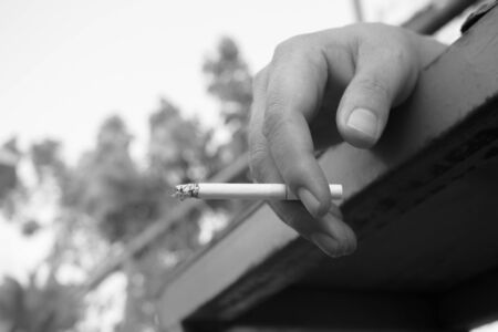 Hand and smoking, portrait concept about smoking.の写真素材