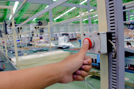 Hand push Emergency button in product line.
