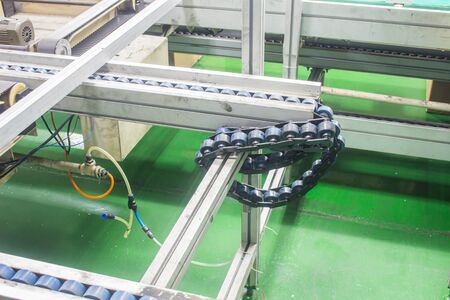 Wait repaie conveyor chain drive shaft production line of the factory. soft focusの写真素材
