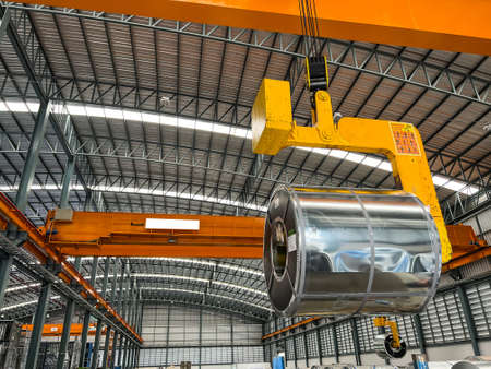lifting master steel coils for move inside warehouseの写真素材