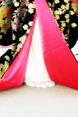 Feet of a Geisha wearing a Japanese traditional kimonoの写真素材