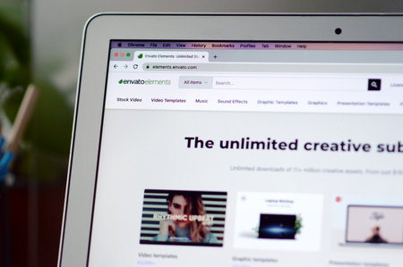 October 14, 2022: Close up of Envato Elements website on laptop screen.のeditorial素材