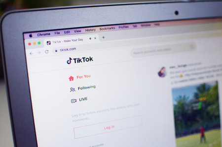 October 14, 2022: Close up of Tiktok website on laptop screen.のeditorial素材
