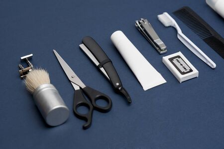Flat lay composition with men's cosmetic products on color background. Space for design