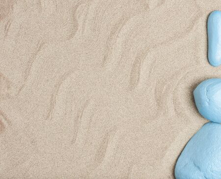 beach sand with light blue stones .top viewの写真素材