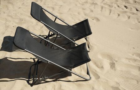two deck chair on the beach yellow sandの写真素材