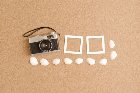 vacation, travel and summer vacation concept: retro camera, white sea shell, on the beach sand. Set of square photo frames. Photographic design illustrationの写真素材