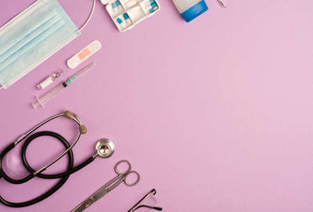 Covid-19 Coronavirus concept. accessories medicine, prevention and vaccination coronavirus, lilac background with copy space. top viewの写真素材