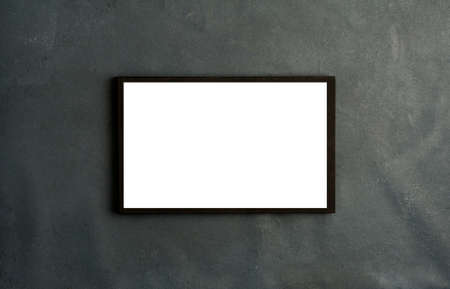 Black rectangular book with frame in white cover, on gray background. top viewの写真素材