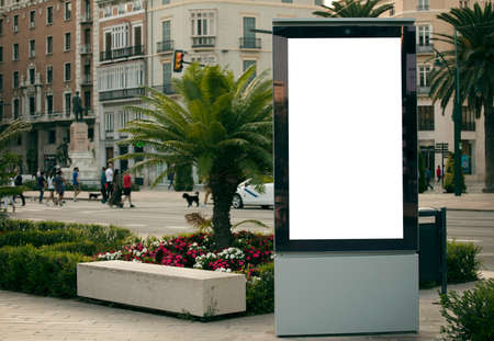 Mockup blank advertising signs and template or light posters with space to copy text or media message and content, blank shadow posters with screen on city wall backgroundの写真素材