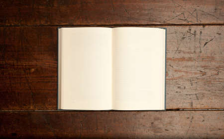retro open book on old wooden table