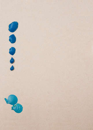 sea shells set, blue, light blue color, on sandy beach background, top viewの写真素材