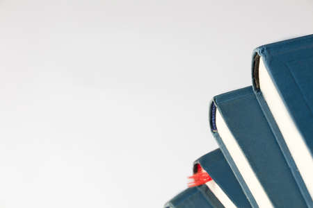 blue books on white backgroundの写真素材